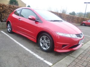 Red Honda Civic gleaming after car valet by mmvaleting.